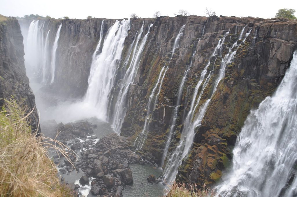 Stunning view of Victoria Falls cascading powerfully over rugged cliffs.