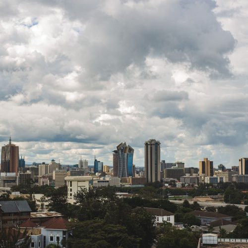 A stunning view of Nairobi's skyline under a dramatic sky.
