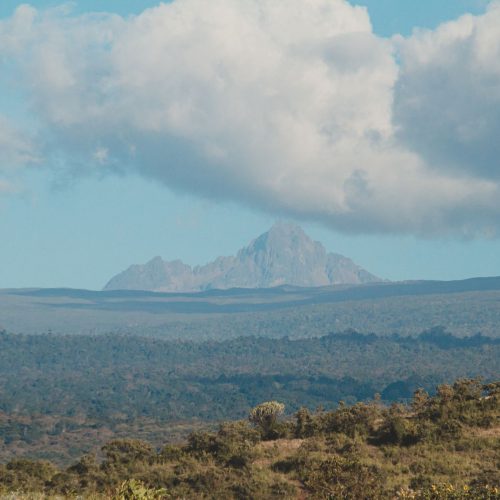 Stunning view of a mountain peak under a dramatic sky, perfect for nature and travel themes.