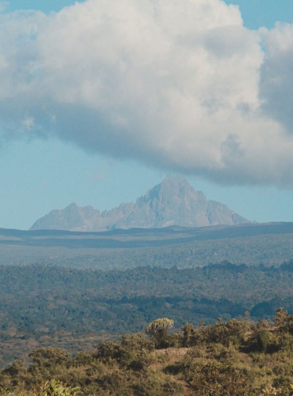 Stunning view of a mountain peak under a dramatic sky, perfect for nature and travel themes.